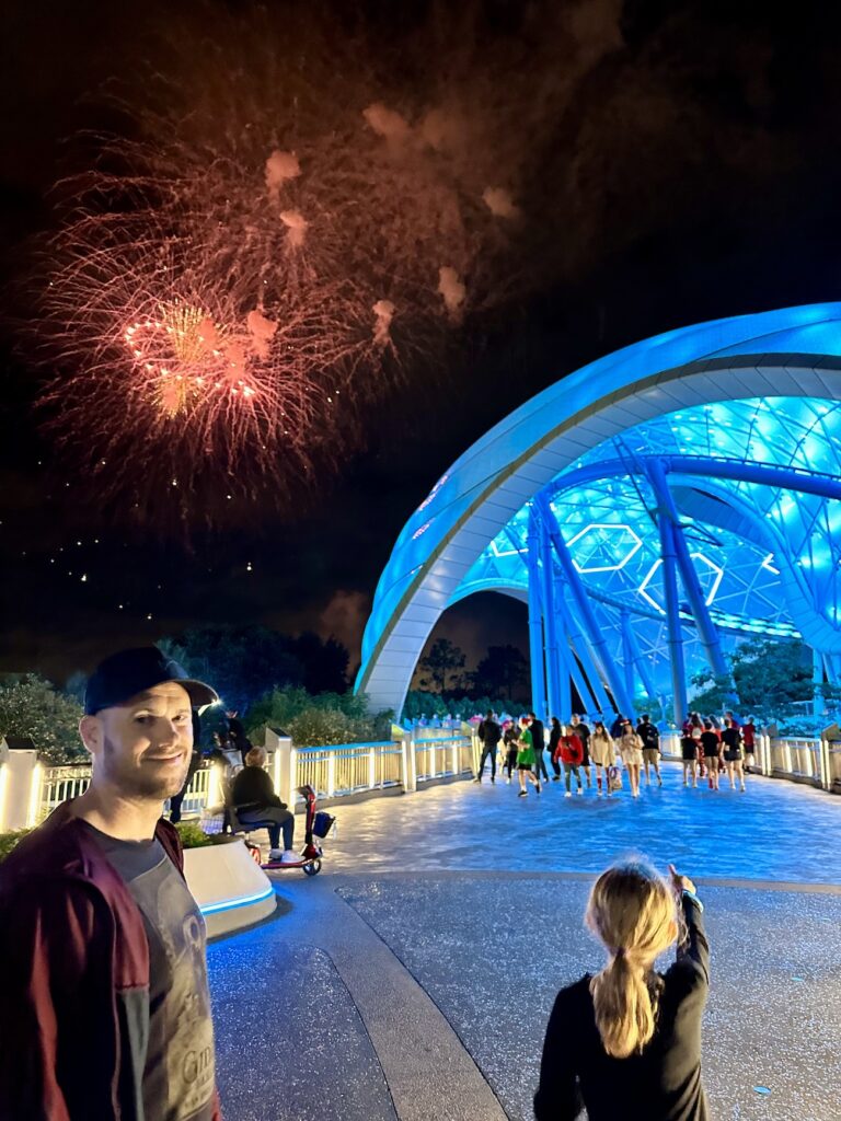 Magic Kingdom fireworks above Tron