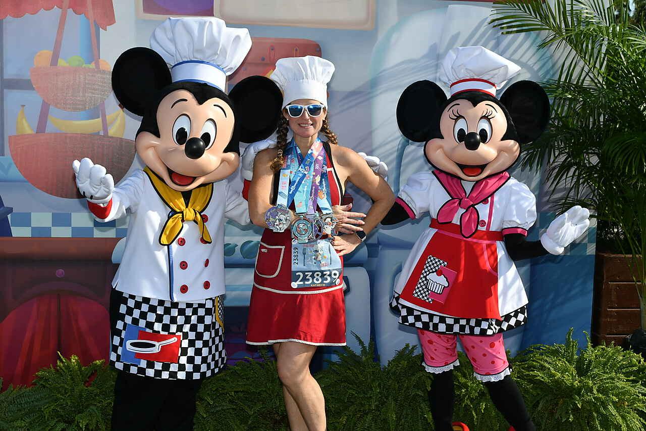 2024 Wine & Dine Half Marathon Weekend Kate with Mickey, Minnie, and race medals