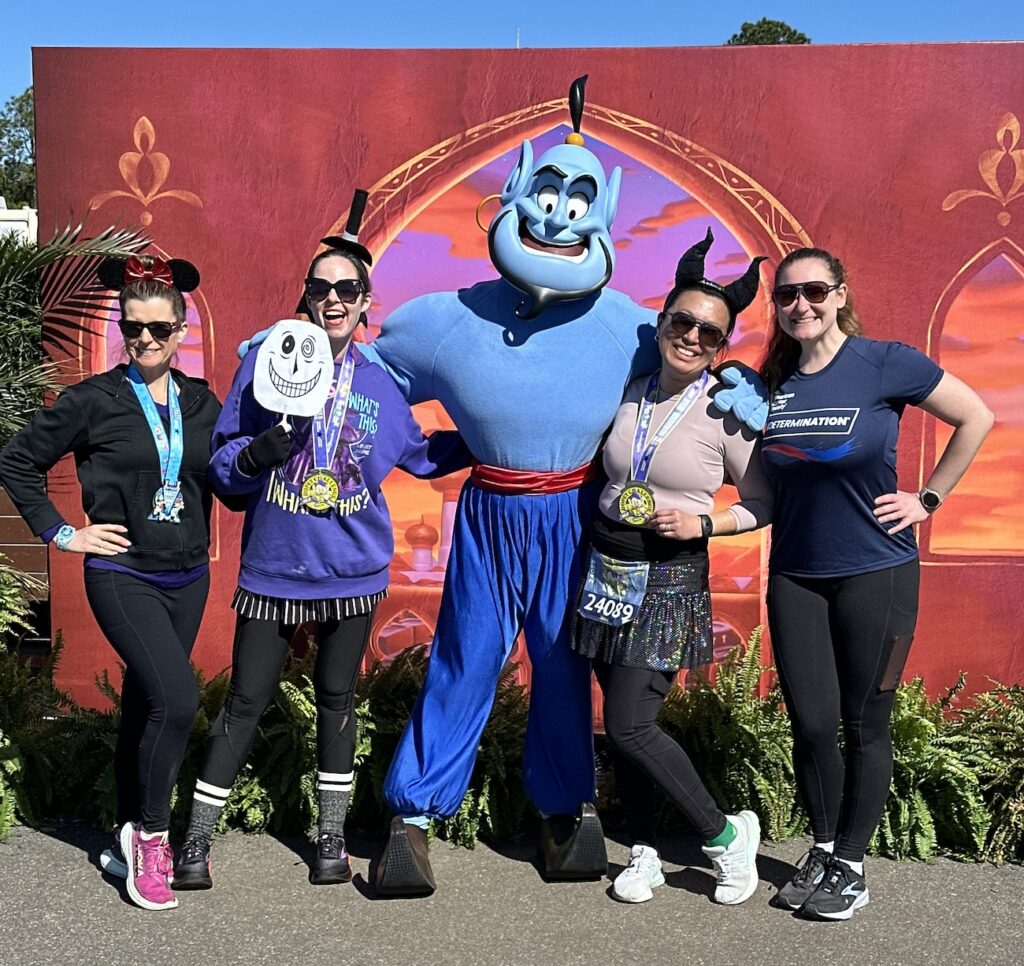 Dopey Challenge finishers with Genie